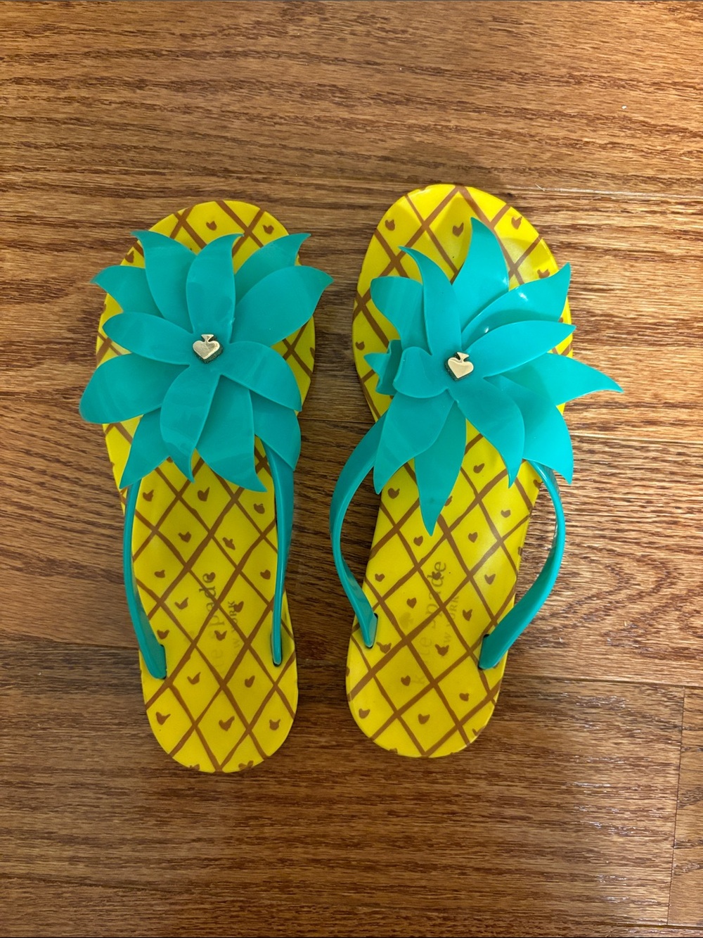 Kate Spade pineapple flip flops